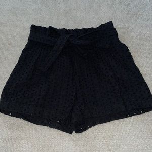 Black shorts with iilit detailing